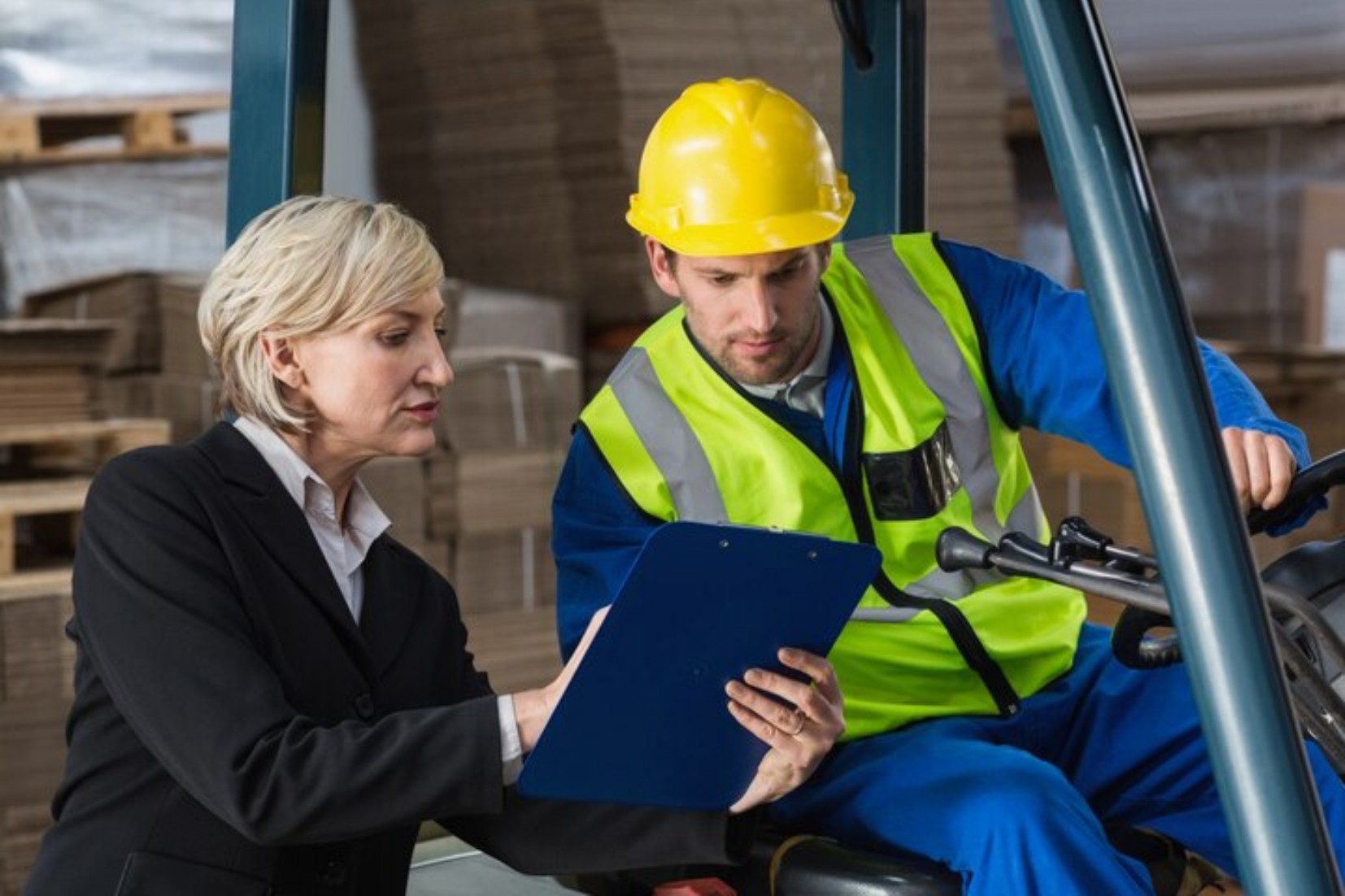 Two professionals discussing a return to work and vocational rehabilitation plan for an injured Melbourne WorkCover claimant